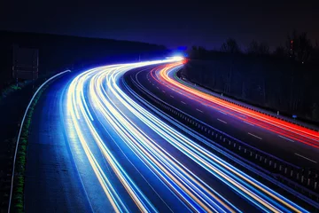 Foto op Plexiglas Snelweg bij nacht Langzeitbelichtung - Autobahn - Strasse - Traffic - Travel - Background - Line - Ecology - Highway - Long Exposure - Motorway - Night Traffic - Light Trails - High quality photo 