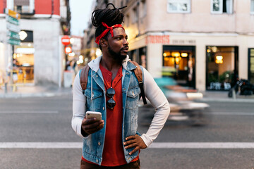 Afro Boy Using Phone