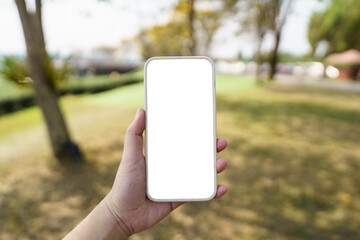 .Close up of women's hands holding cell telephone blank copy space screen. smart phone with technology concept