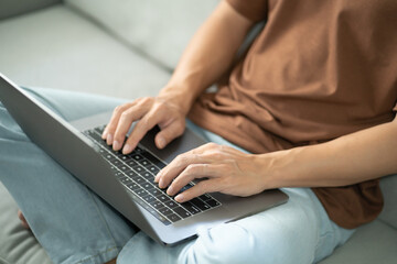 Man work from home. work online on laptop. Asian businessman working online business concept with social distancing laptop online meeting.