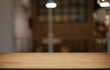 Empty wooden table in front of abstract blurred background of coffee shop . can be used for display or montage your products.Mock up for display of product