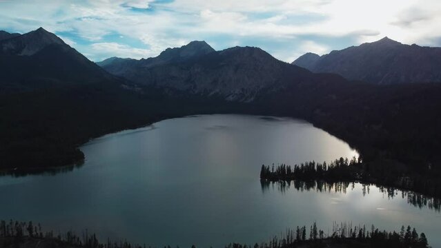 Silhouette View Of Pettit Lake And Sawtooth Mountain Range In Idaho, United States. aerial