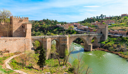 Fototapeta na wymiar Puente de Alcantara- Roman arch bridge in Toledo- tourism in Spain