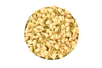 Top view of Dried Jasmine flowers on white background. Heap pile of Jasmine buds. herbal Tea ingredients. floral texture, pattern. Fragrant Natural Pure Jasmine Buds Organic Dried Jasmine Flowers.