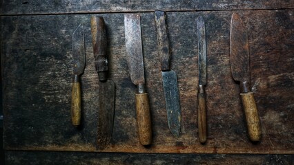 vintage knife or cleaver on dark wooden background