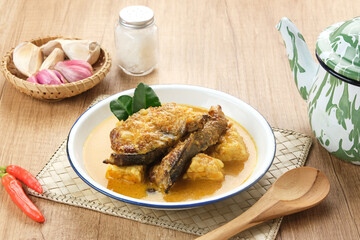 Mangut, made from smoked stingray fish cooked with spices and coconut milk. Indonesian traditional food.
