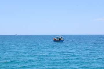 Fototapeta na wymiar fishing boat in the sea, ninh thuan