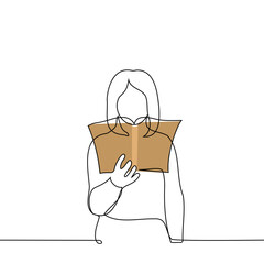 woman standing with open book at head level - one line drawing vector. concept reading a book, choosing a book
