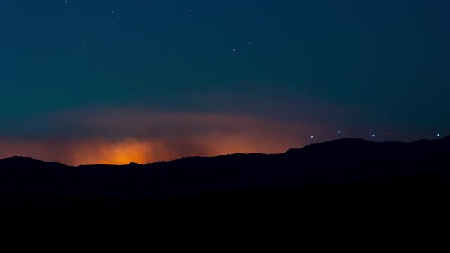 Time lapse of night view of the forest fire of Bejis, Spain on 08-16-2022 4K