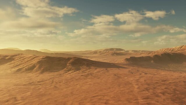 Sunset over the sand dunes in the desert