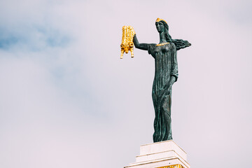 Batumi, Adjara, Georgia. Statue Of Medea On Sky Background In Europe Square. Woman Holding Golden...