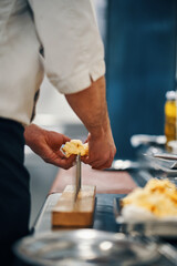 Finishing a haute cuisine dish, plating the dish                             
