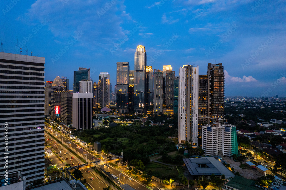 Wall mural aerial photos of Sudirman street and Jakarta Skyline in the golden hour. 