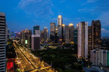 Fototapeta premium aerial photos of Sudirman street and Jakarta Skyline in the golden hour. 