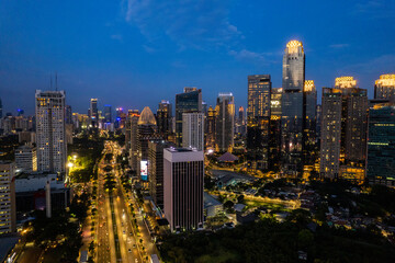 Fototapeta premium aerial photos of Sudirman street and Jakarta Skyline in the golden hour. 