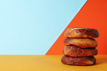 Fototapeta na wymiar Concept of tasty food - bagel, space for text