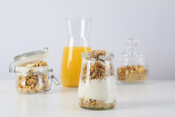 Tasty and nutritious breakfast concept - muesli with yogurt