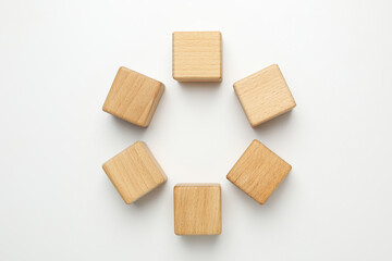 Blank wooden cubes for different concepts, top view