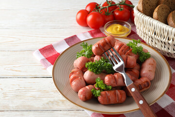 Concept of tasty food, grilled mini sausage, space for text