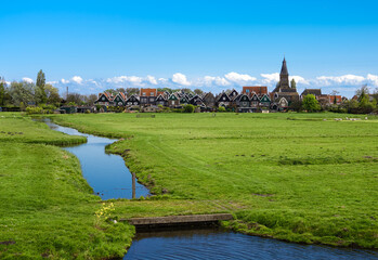The quaint rural town of Marken island in the Netherlands is full of stunning architecture and...