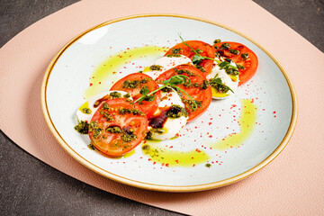 tomato with mozzarella and olive oil