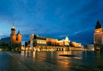Fototapeta premium St. Mary's Church in the evening with a city in the background, in Krakow, Poland