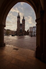 Vertical shot of the St. Mary's Church in the evening, in Krakow, Poland © Bo Gao/Wirestock Creators