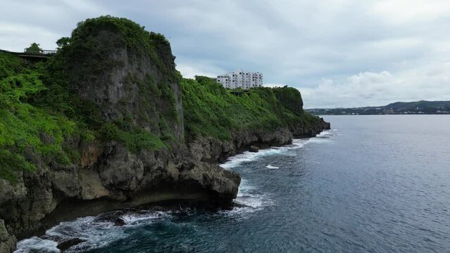 Aerial Shot Of Lush Greenery At Oka Point Cliff Along The Island In Tamuning, Guam, United States.