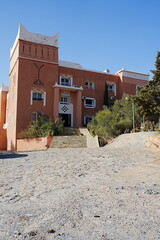 Facade of mansion in african Tafraout town in Morocco - vertical