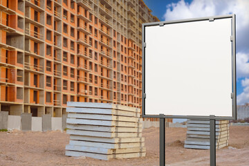 Construction site. Empty signboard near panel house. Construction of multi-storey building. Signboard for construction company info. White advertising banner. Template for building business. 3d image