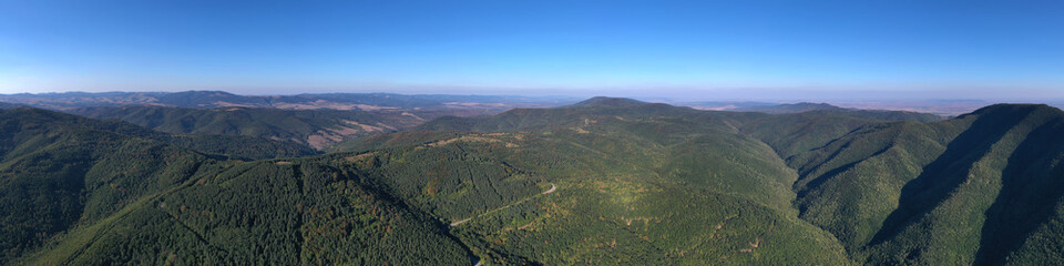 Panoramic Aerial View view of green mountain hills