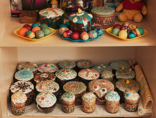 Traditional Easter baking. Easter cake and colored eggs. Close-up