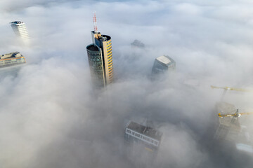 Aerial beautiful spring morning fog view of Vilnius business skyscraper downtown, Lithuania