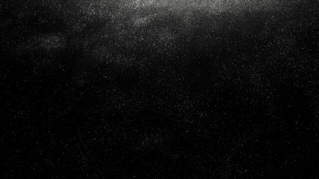 Dust texture. Grain overlay. Night stars. Galaxy stardust. White shiny glitter powder particles on dark black abstract background.