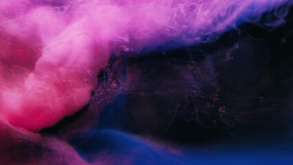 Neon smoke. Paint water. Vapor wave. Dreamlike cloud. Bright pink blue purple color haze flow on...