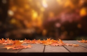 Naklejka na ściany i meble Autumn Leaves on Wooden Table. Blurred Background with Space for Product