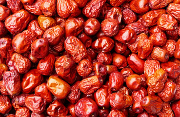 food background with close-up dried red fruits
