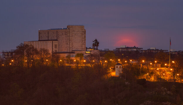 A rising full moon above the National Monument at V&iacute;tkov in Prague. 