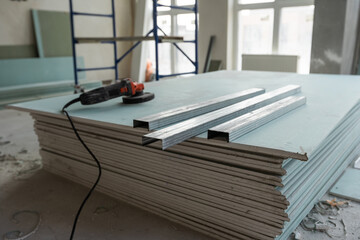 Working process of installing metal frames for plasterboard -drywall - for making gypsum walls in...