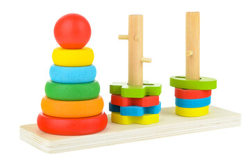 A colored pyramid for a child, isolated on a white background. Educational bright toys for toddlers and babies. The development of motor skills and the study of colors