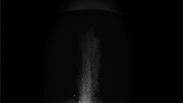 Big Explosion of Snow and Soil. A column of soil and dust rises into the air from the explosion. Isolated on black. Use in blend modes to simulate a battlefield