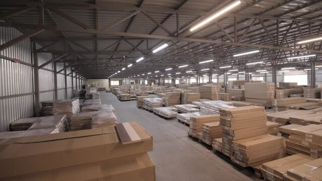 Storehouse. Furniture Factory. Products at the warehouse. Industrial interior storage room.