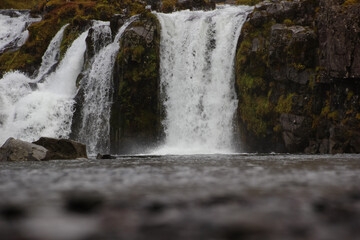 Fantastic view on Kirkjufellsfoss waterfall near Kirkjufell mountain