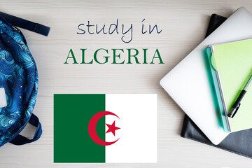 Study in Algeria. Background with notepad, laptop and backpack. Education concept.