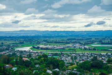 Stunning aerial view over town of Whakatane. The heart of the Eastern Bay of Plenty, New Zealand, it's nested between Whakatane River and bush-clad cliffs. Kohi Point Lookout, Whakatane, New Zealand