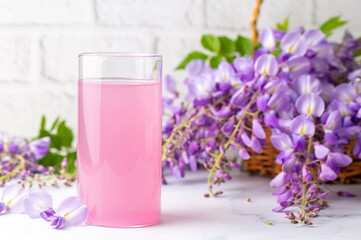 Fototapeta na wymiar Drink for health made from Wisteria sinensis flower. Wisteria sinensis sherbet. Turkish name; Mor salkim serbeti