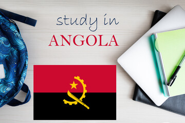 Study in Angola. Background with notepad, laptop and backpack. Education concept.