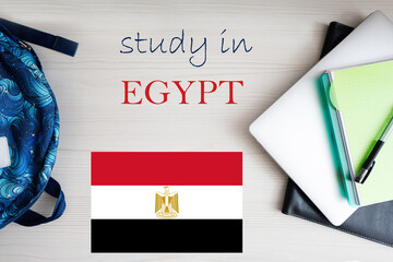 Study in Egypt. Background with notepad, laptop and backpack. Education concept.