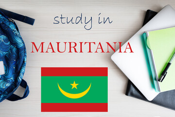 Study in Mauritania. Background with notepad, laptop and backpack. Education concept.