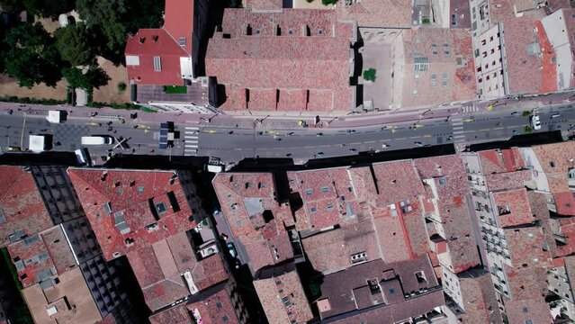 Top-down shot of a cyclist cycling on  les dimanches de respiration track in Montpellier
